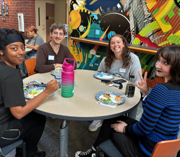 Students gathered at a table.
